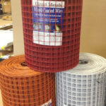 Three Rolls of PVC Wire Mesh In The Colors Red, Orange, And White from Direct Metals